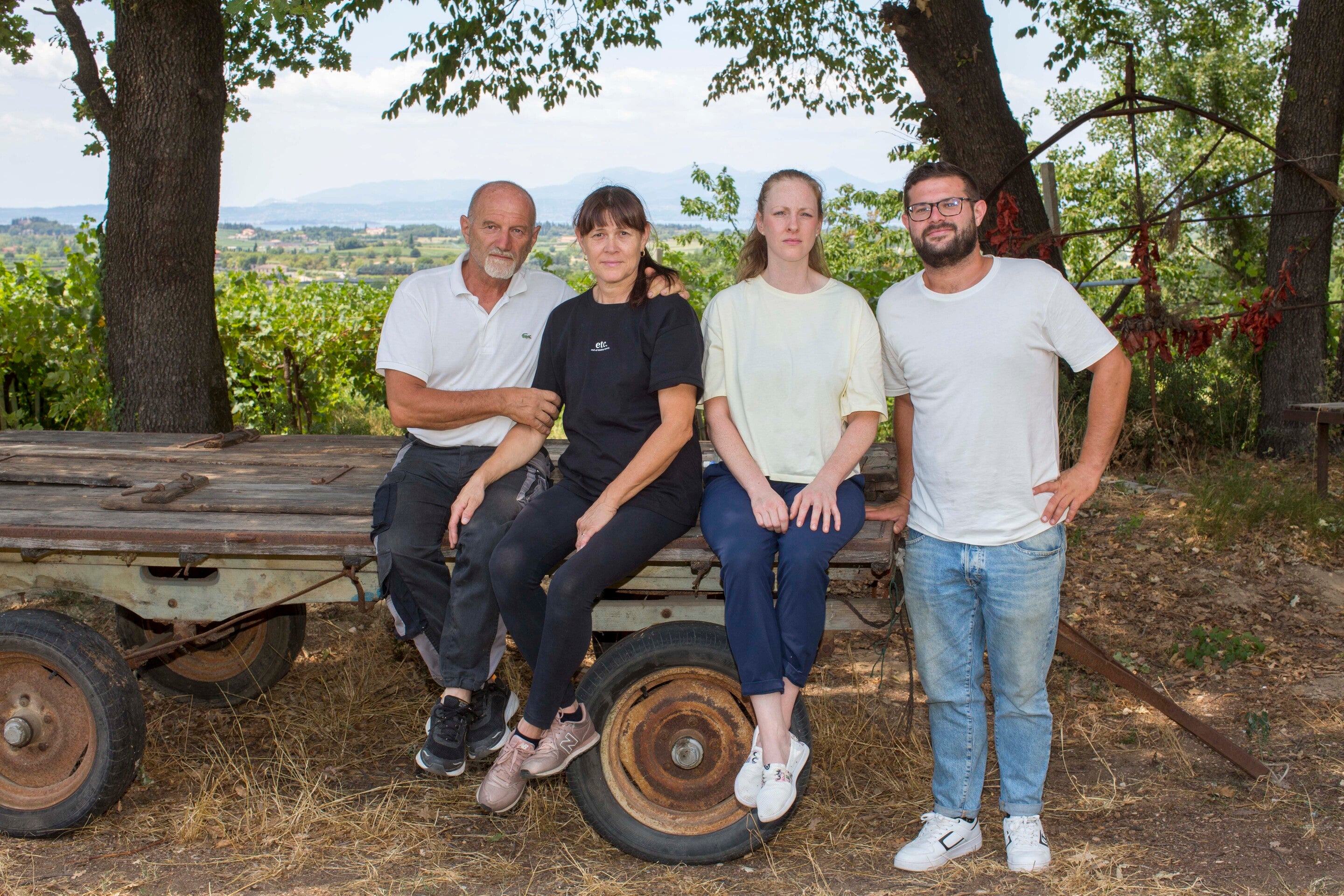 The Castellani family working together in their organic winery near Lake Garda