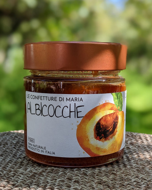 Jar of Agricola Castellani Organic Apricot Marmalade made from 100% Italian cherries, perfect for spreading on bread, adding to cheese boards, or using in desserts.