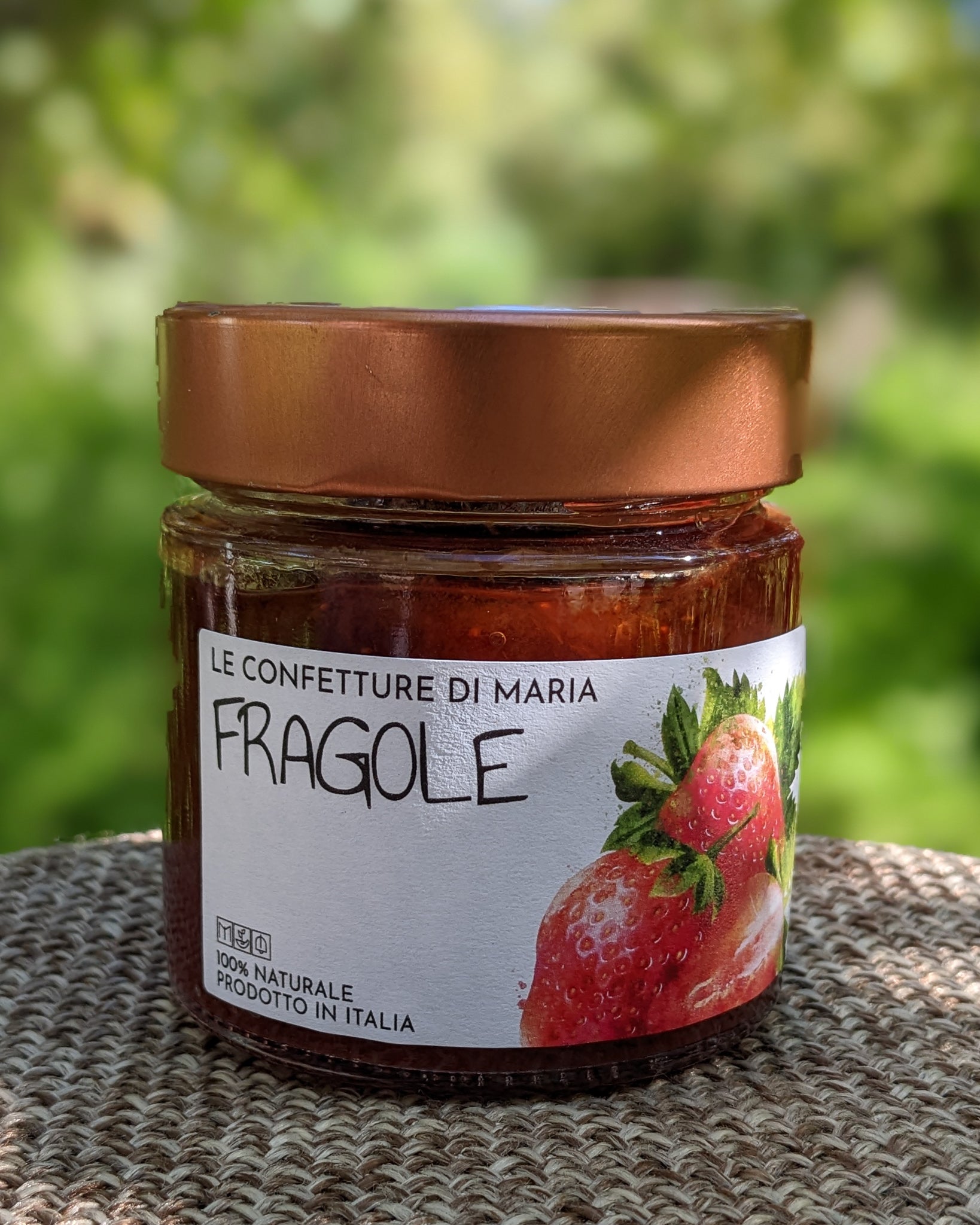 Jar of Agricola Castellani Organic Strawberries Marmalade made from 100% Italian cherries, perfect for spreading on bread, adding to cheese boards, or using in desserts.