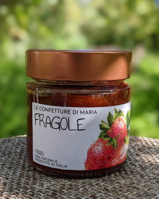 Jar of Agricola Castellani Organic Strawberries Marmalade made from 100% Italian cherries, perfect for spreading on bread, adding to cheese boards, or using in desserts.